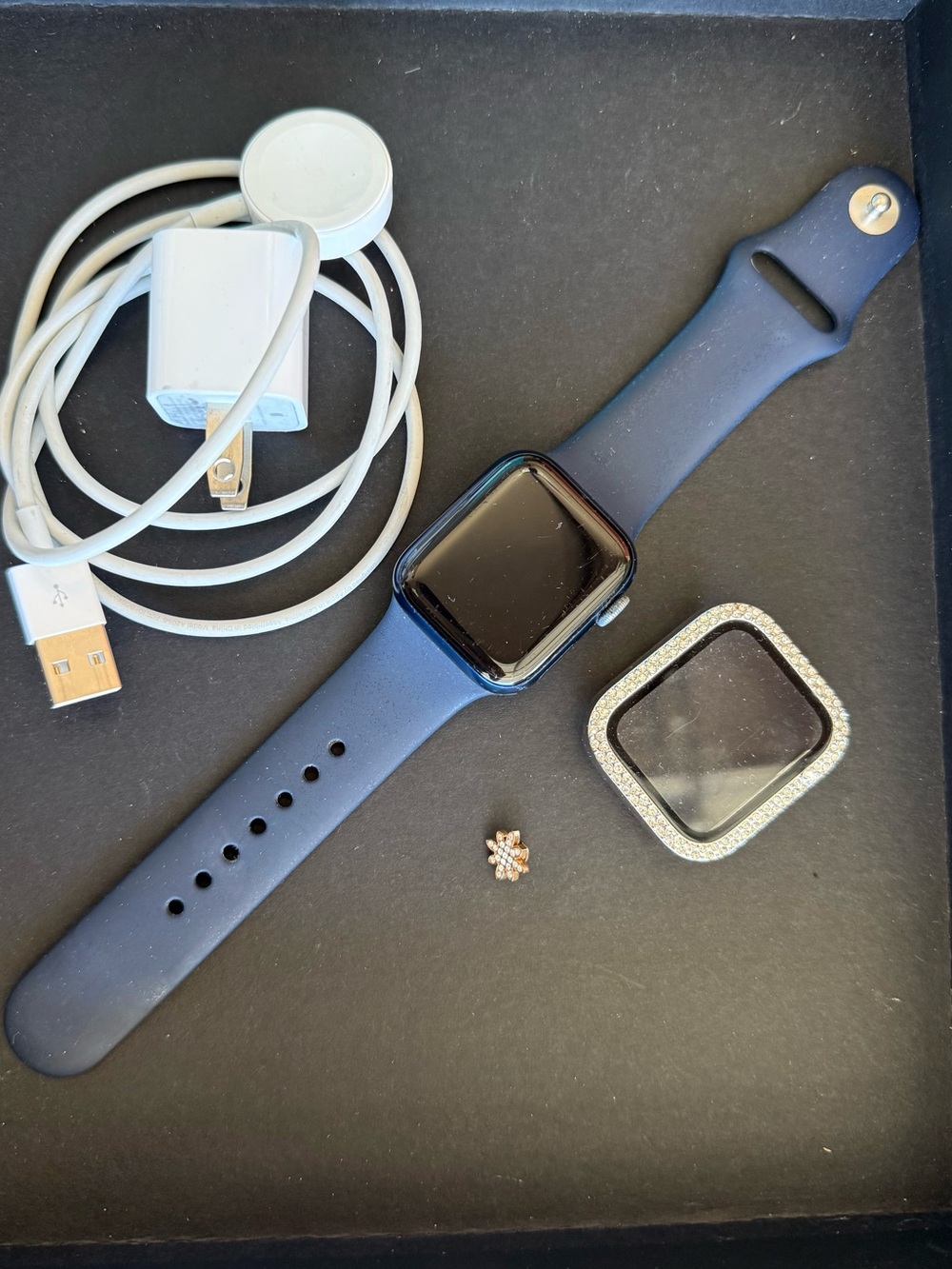 Apple Watch with Navy Blue Band and Gold Metal Link Strap